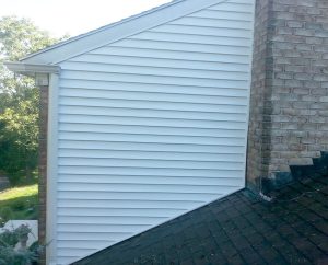 Residential siding power washing after